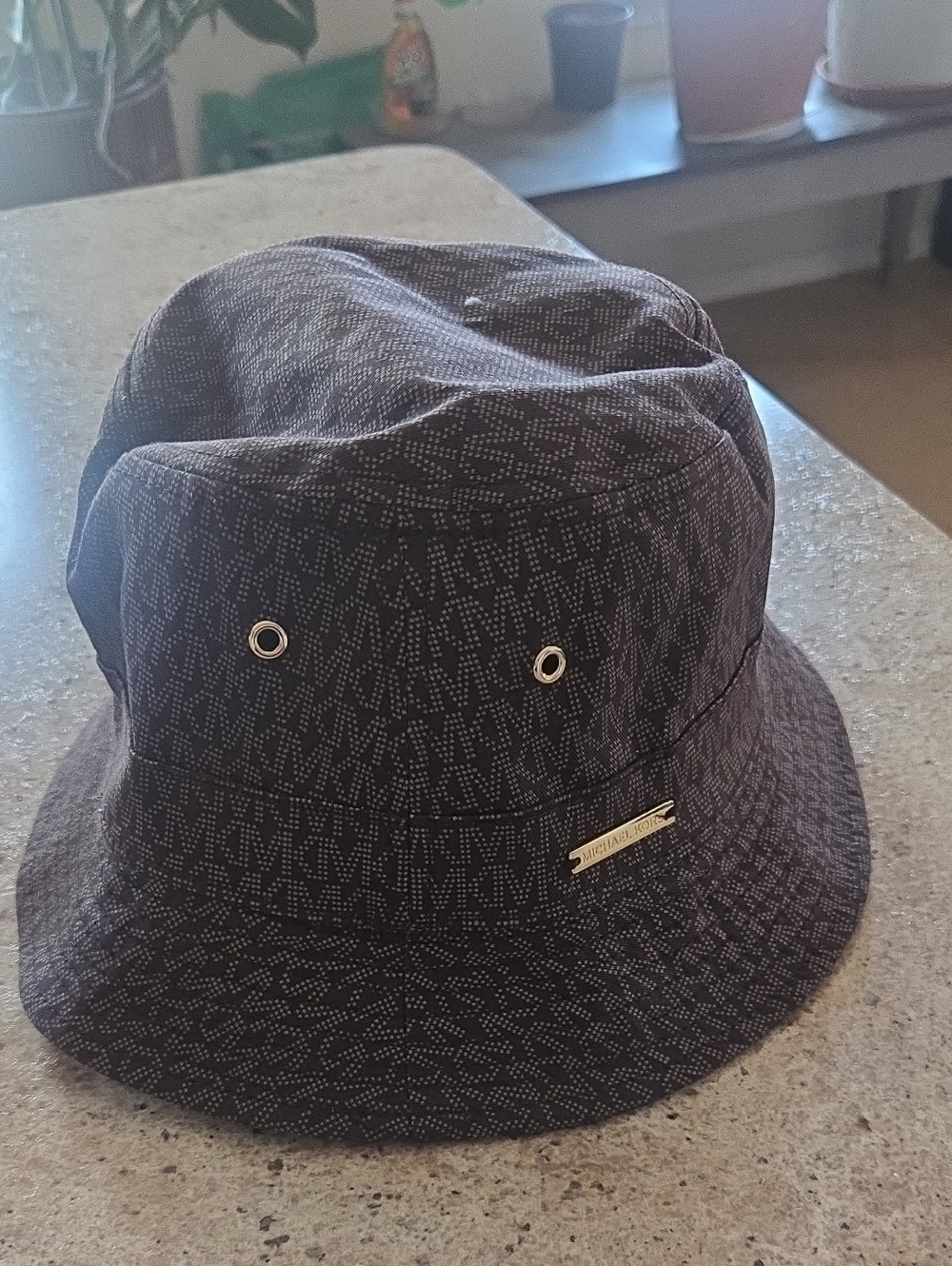 Michael Kors Brown MK Monogram Bucket Hat with Gold Plaque